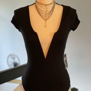 Express Body suit brand new tags never worn